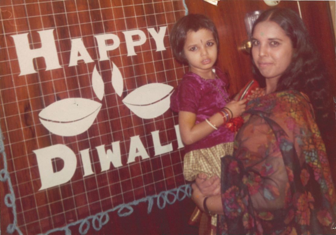 A childhood photo of Lakshmi with her mom, who cooks alongside her in the 