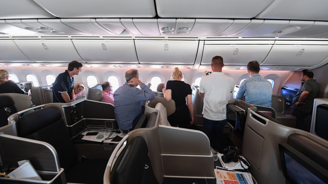 Passengers on board the flight taking a look at the views out the window.