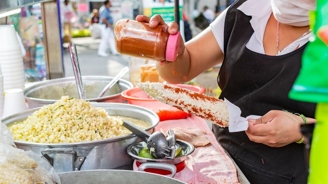 Grilled corn is a popular snack.